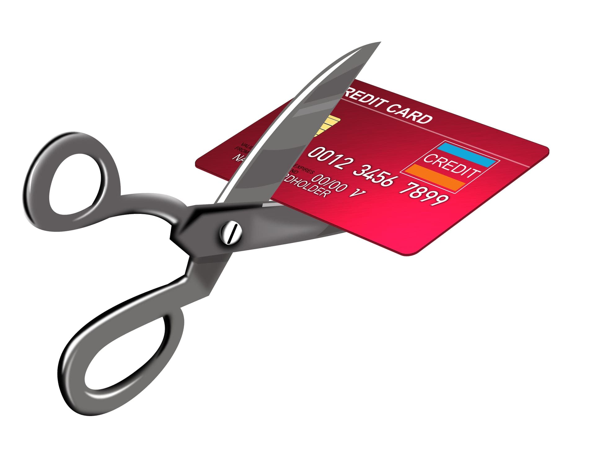 Scissors cutting a credit card, representing debt freedom