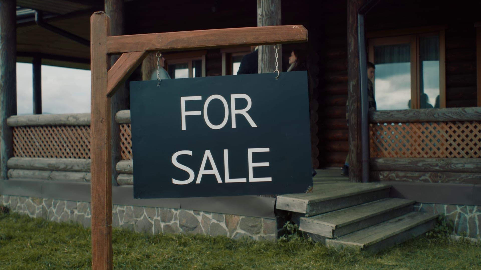 Real estate agent with family at property