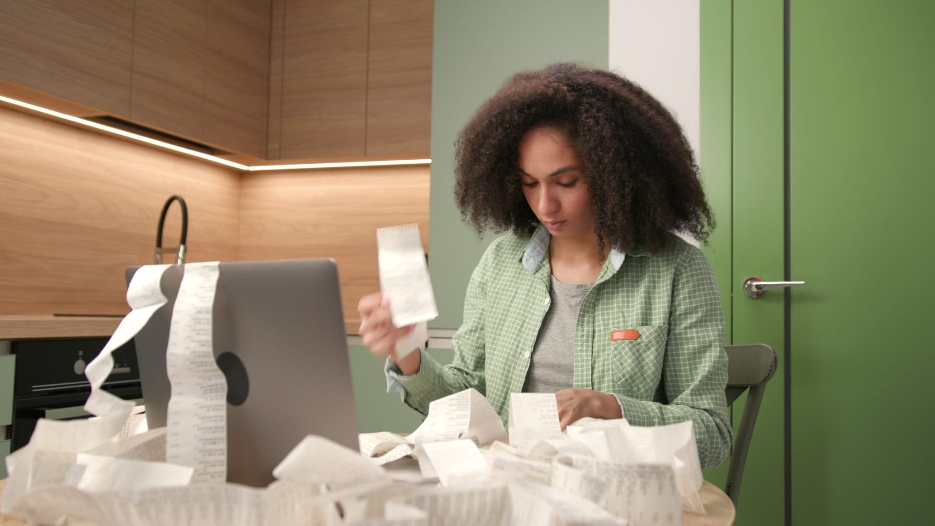 Woman managing multiple financial accounts